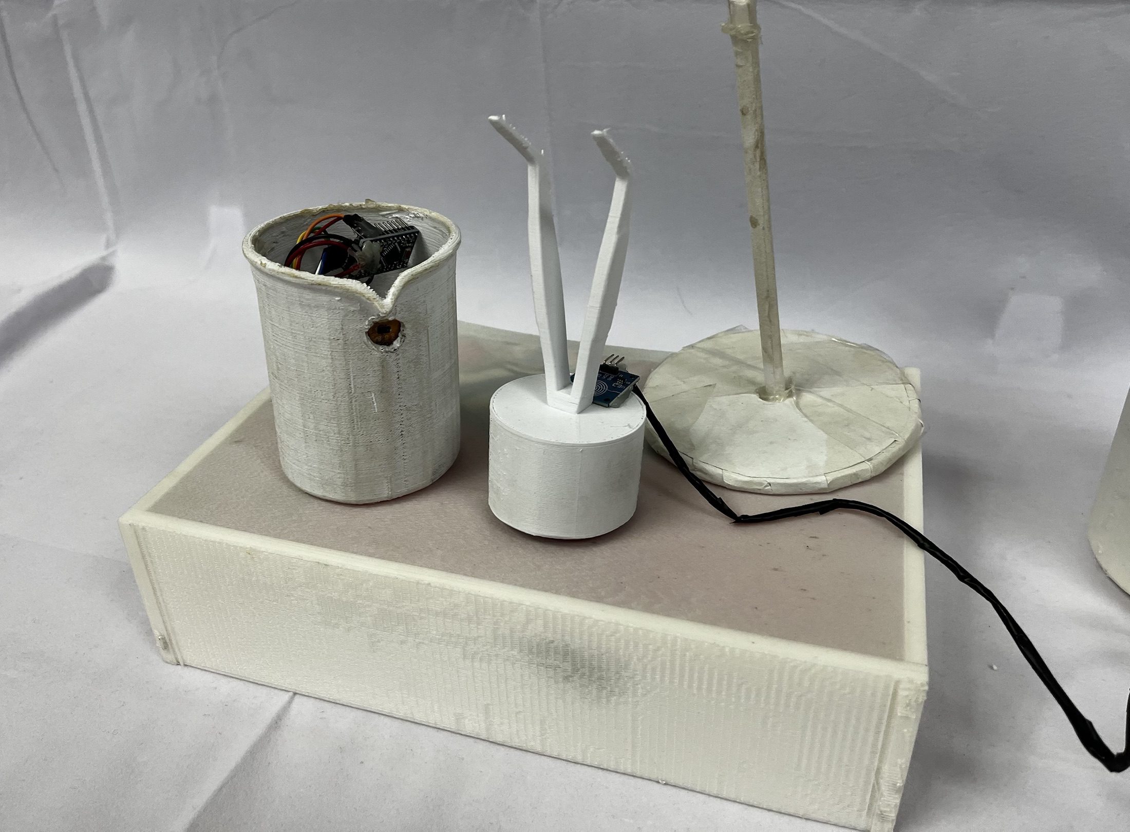 Smart Chemistry Lab prototype tools arranged on a white base